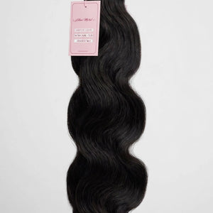 Raw body wave human hair bundle with Lillian Michel Co. tag